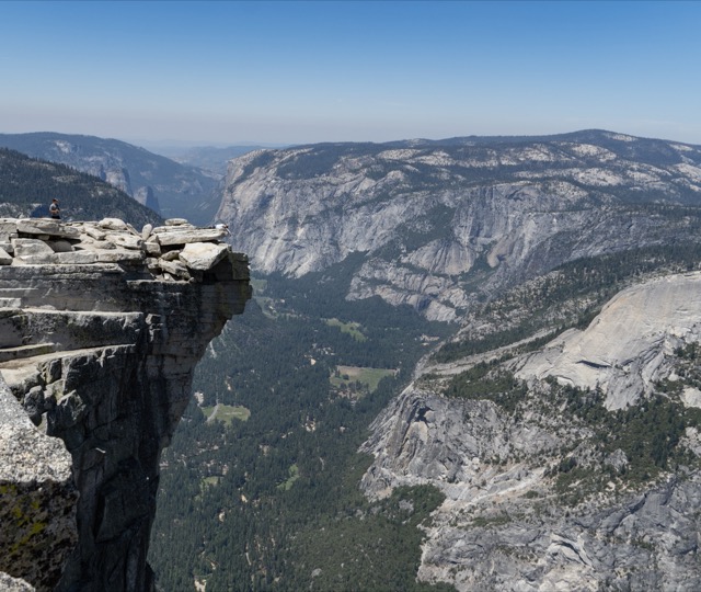 James hanging over the edge of Half Dome. ©2021 David Rogers