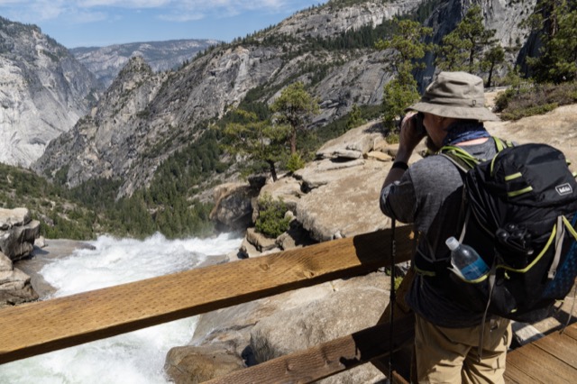 James taking a picture from the top of Nevada Falls. ©2021 David Rogers