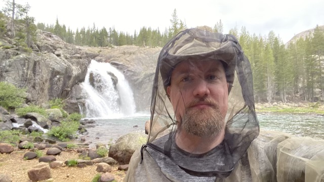 James in mosquito net at the falls